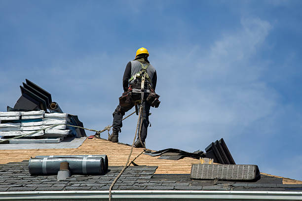 Professional Roofing technician working in Slayden, TN